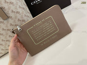 Coach double-sided carriage bag